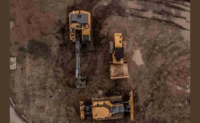 Aerial view of a modern urban development showcasing current real estate trends and challenges