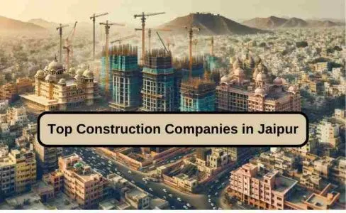 Aerial view of construction sites in Jaipur with cranes and modern buildings