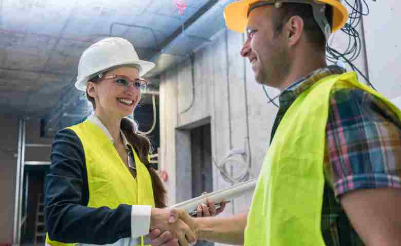 FRICS certified professional overseeing a construction site