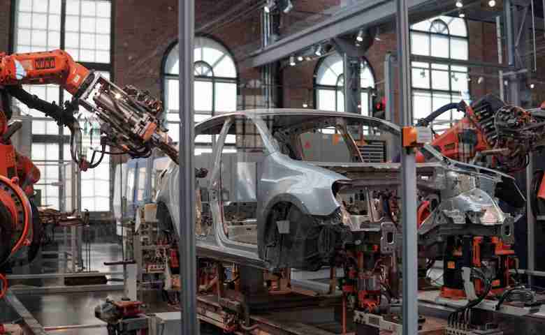 Close-up of high-quality automotive components on an engineer's workspace
