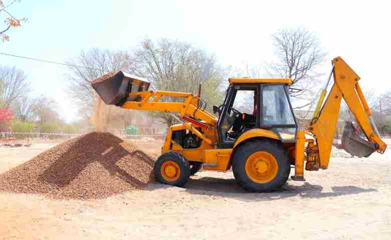 A construction site with heavy equipment such as bulldozer.