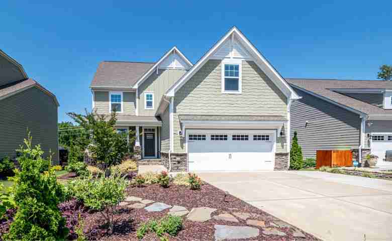 The Timeless Elegance and Practicality of Wooden Garage Doors
