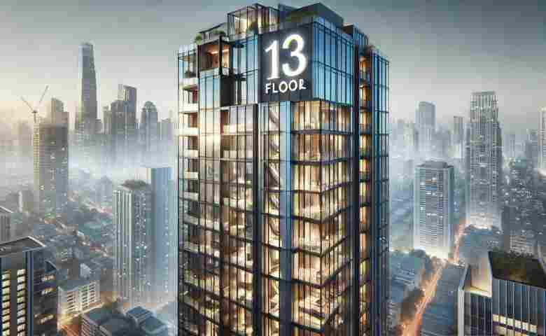 A modern high-rise building showcasing the 13th floor with panoramic city views.