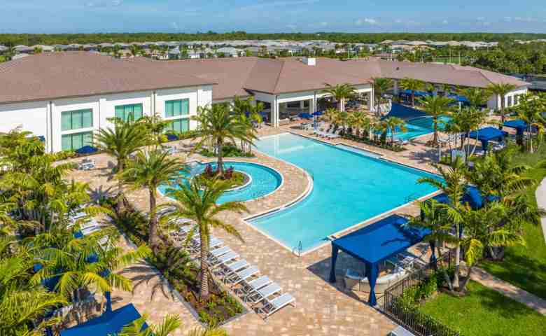 An aerial view of GL Homes Valencia Trails club pool in its Naples community.