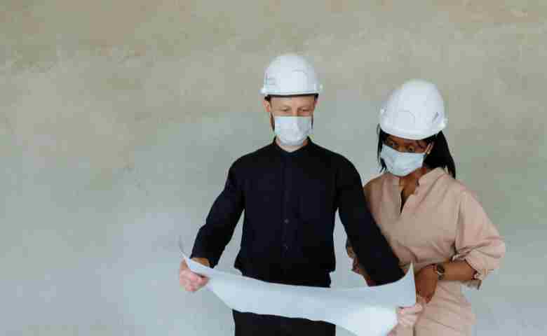 Ensuring compliance with building safety regulations at a modern construction site.