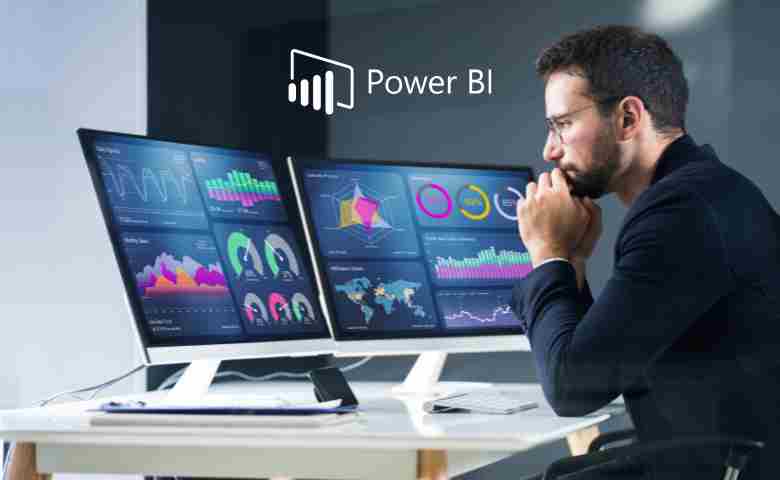 A data analyst using Microsoft Power BI on a laptop with construction site images in the background.