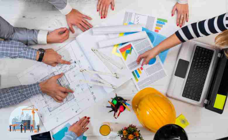 Aspiring construction entrepreneur planning business strategy on blueprints