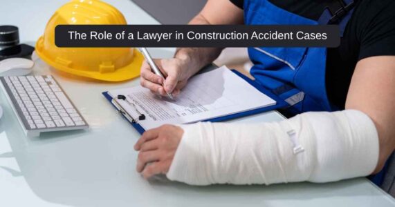 A construction accident lawyer consulting with a client at a legal desk with construction gear in the background.