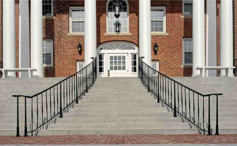 Modern stainless steel and glass railing system in a contemporary building.