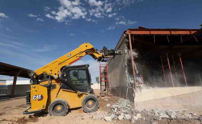 Skid steer loaders for sale in Wilmington construction yard