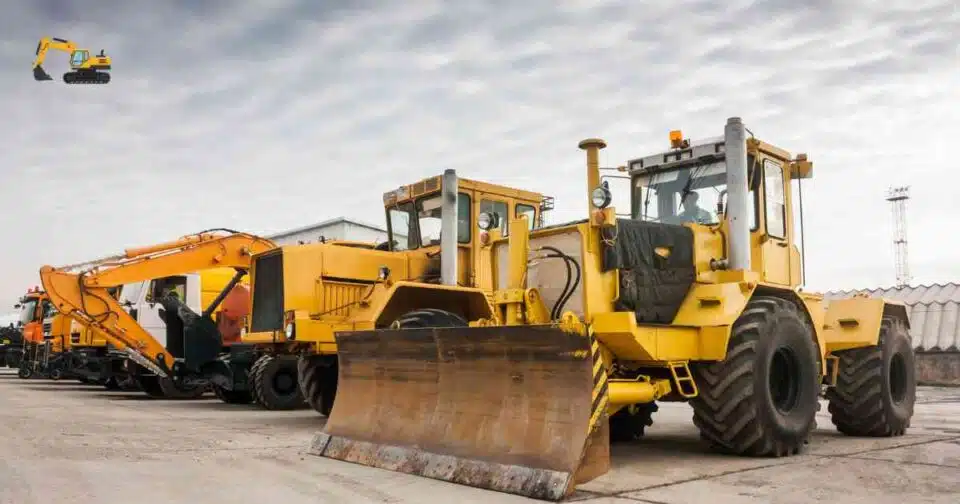 Affordable construction machinery rental options in Pennsylvania showing excavators and loaders at a job site.